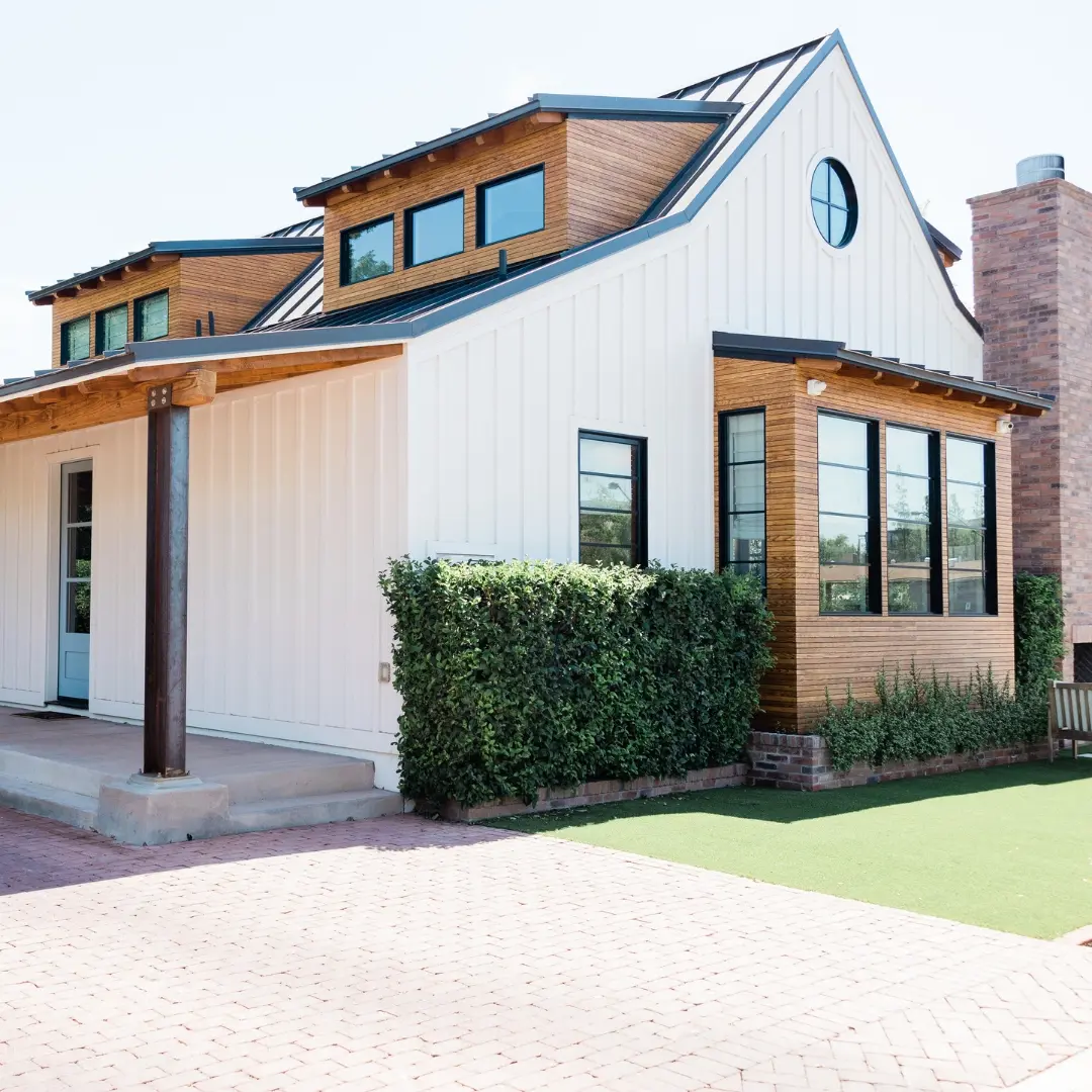 Modern farmhouse with wood accents.