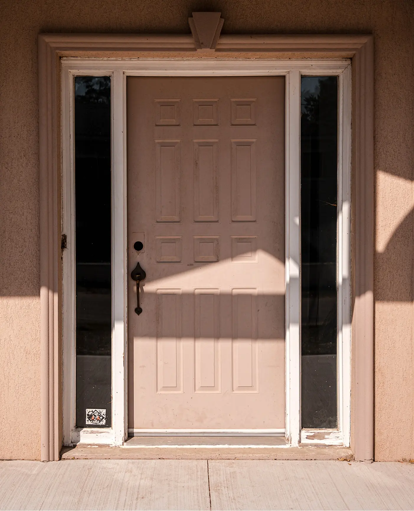 Old entrance door with minimalist design