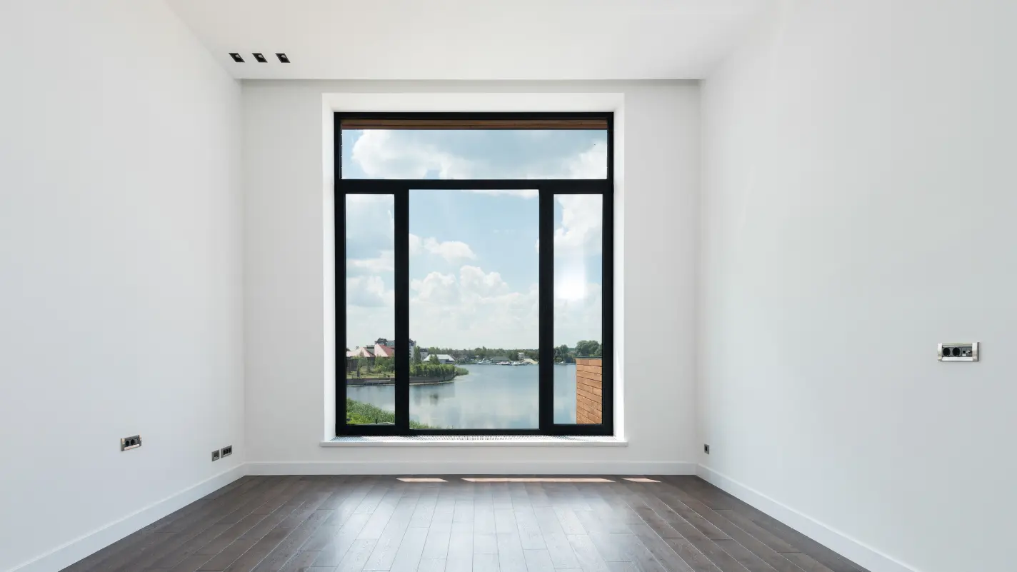 Large panoramic window with black frames