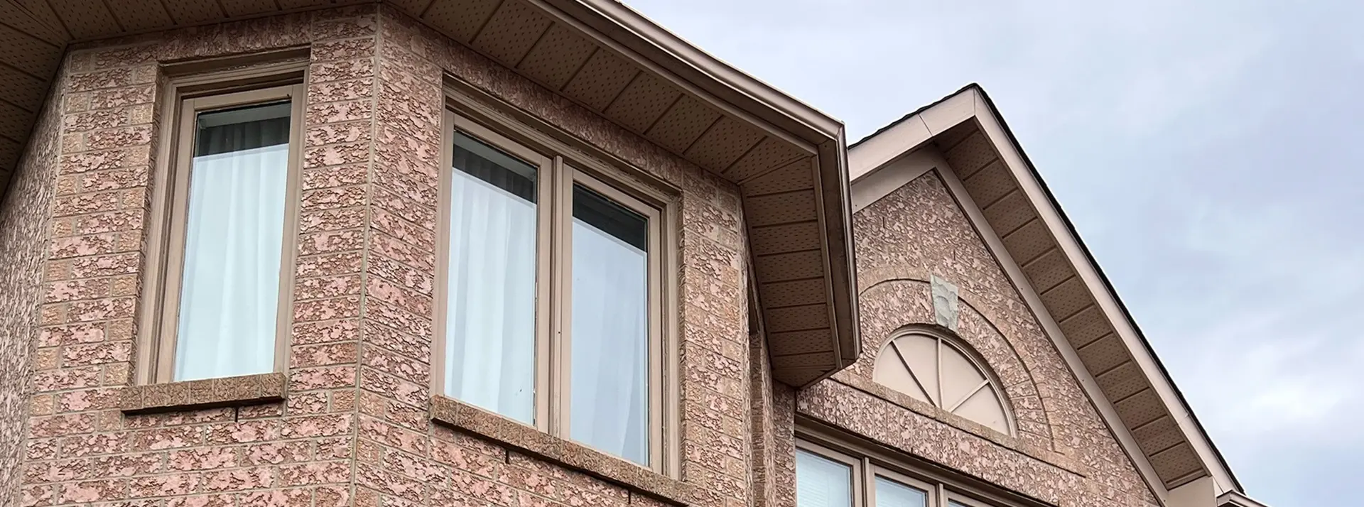 House facade with beige windows