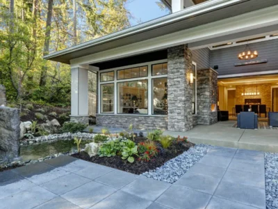 Folding glass wall opening a living room onto the terrace
