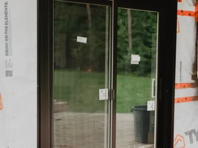 New sliding patio door fitted into a prepared opening