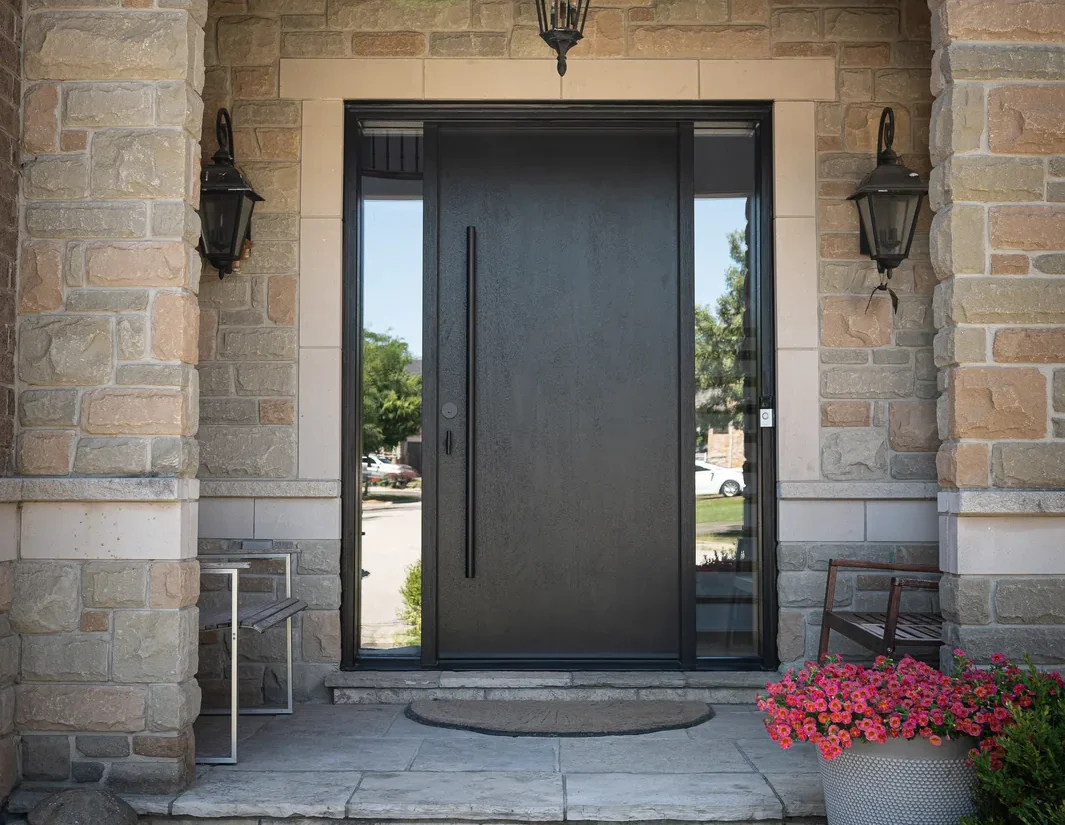 Entry door with sidelite, stone facade